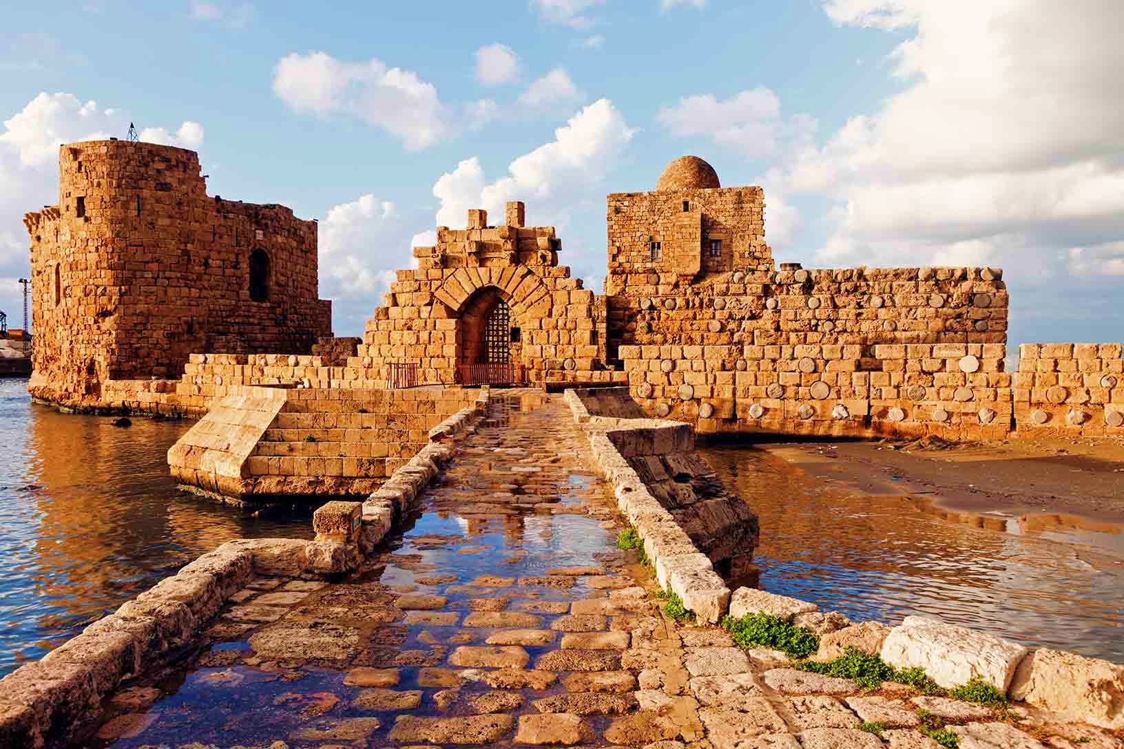 Sidon Sea Castle, a historic Crusader fortress with stone towers surrounded by Mediterranean waters in Lebanon